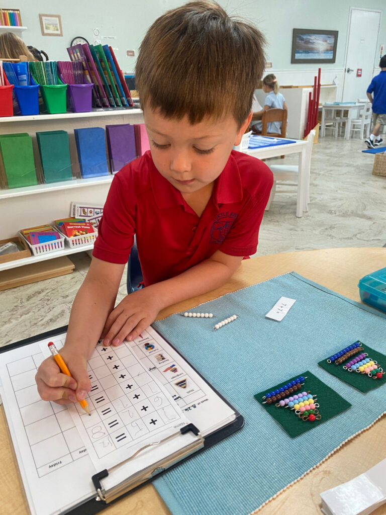 Trey learning at school - kindergarten year